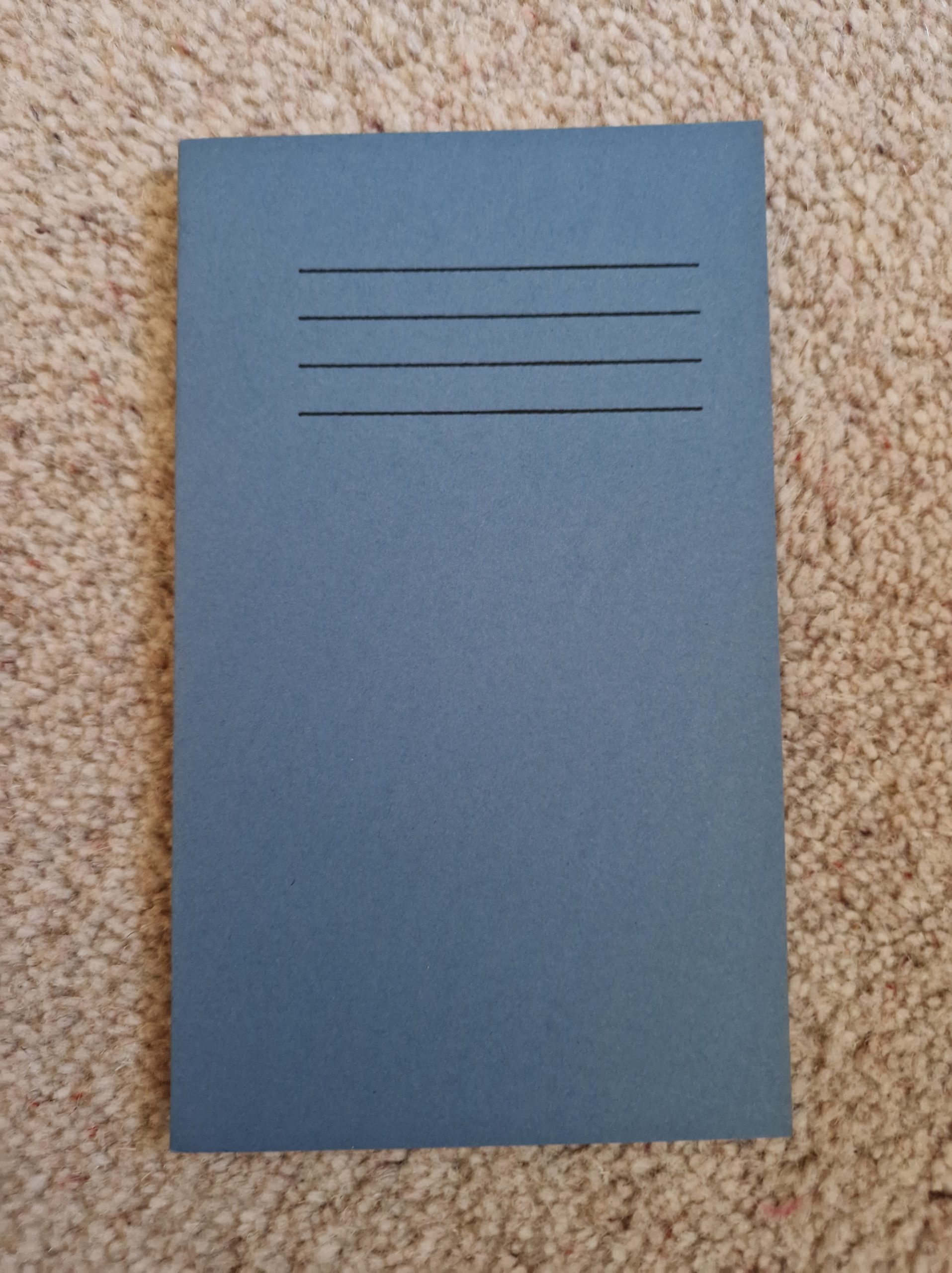A6 blue lined note book